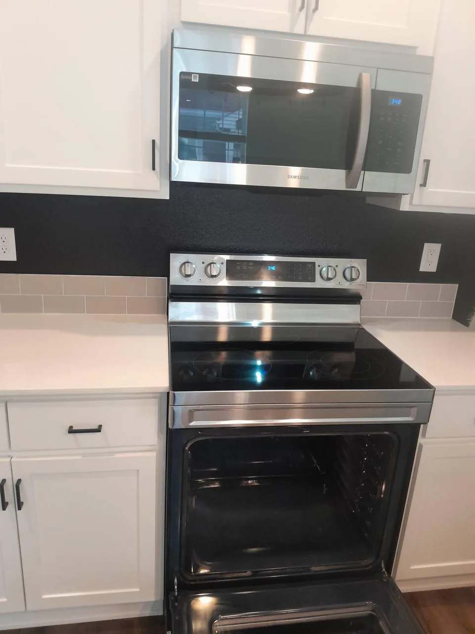 Spotless kitchen with a clean range in a Whitman, MA home